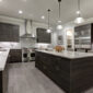 A large, clean modern kitchen in a home.